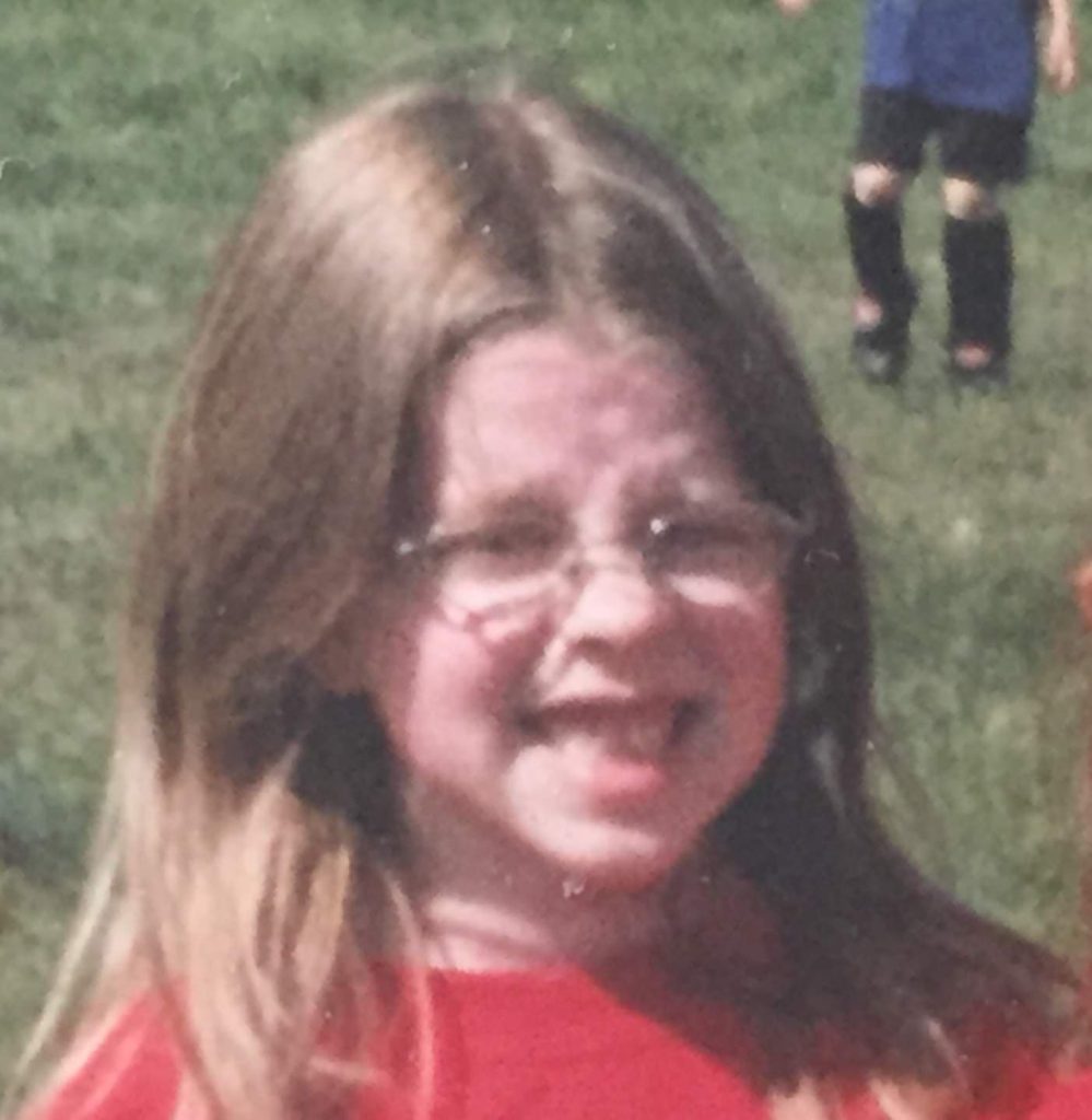 Childhood photo of author Grace Gidman, who dreamed of writing and publishing books from a young age.